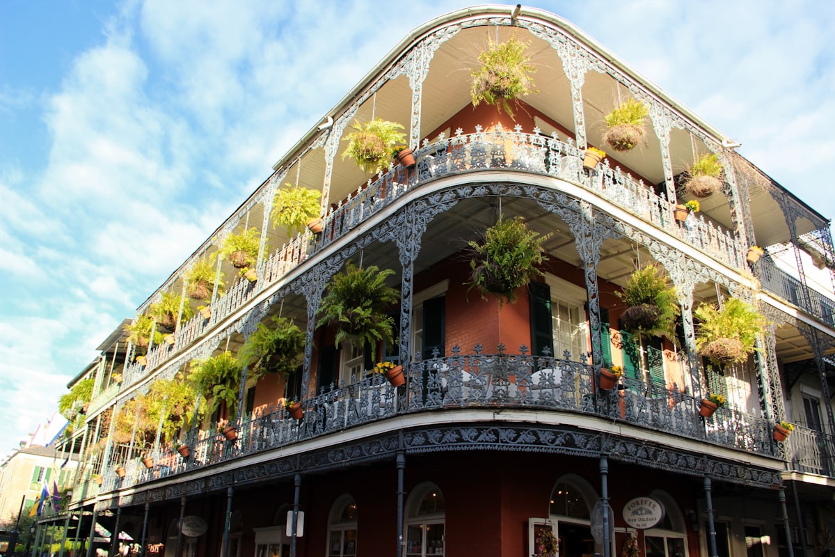 French Quarter architecture in New Orleans under a blue sky