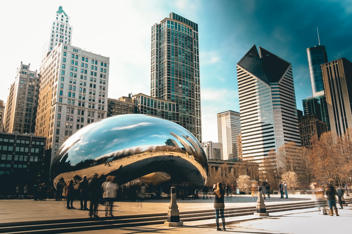 Visitors around the Cloud Gate sculpture in Millennium Park, Chicago