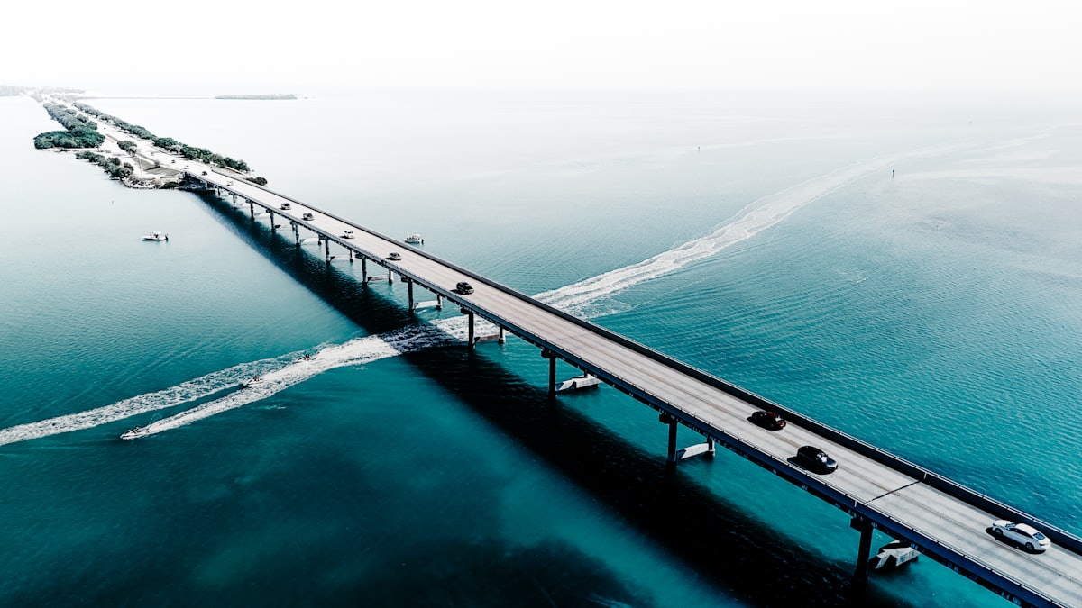 A bridge spanning calm blue ocean in the Florida Keys