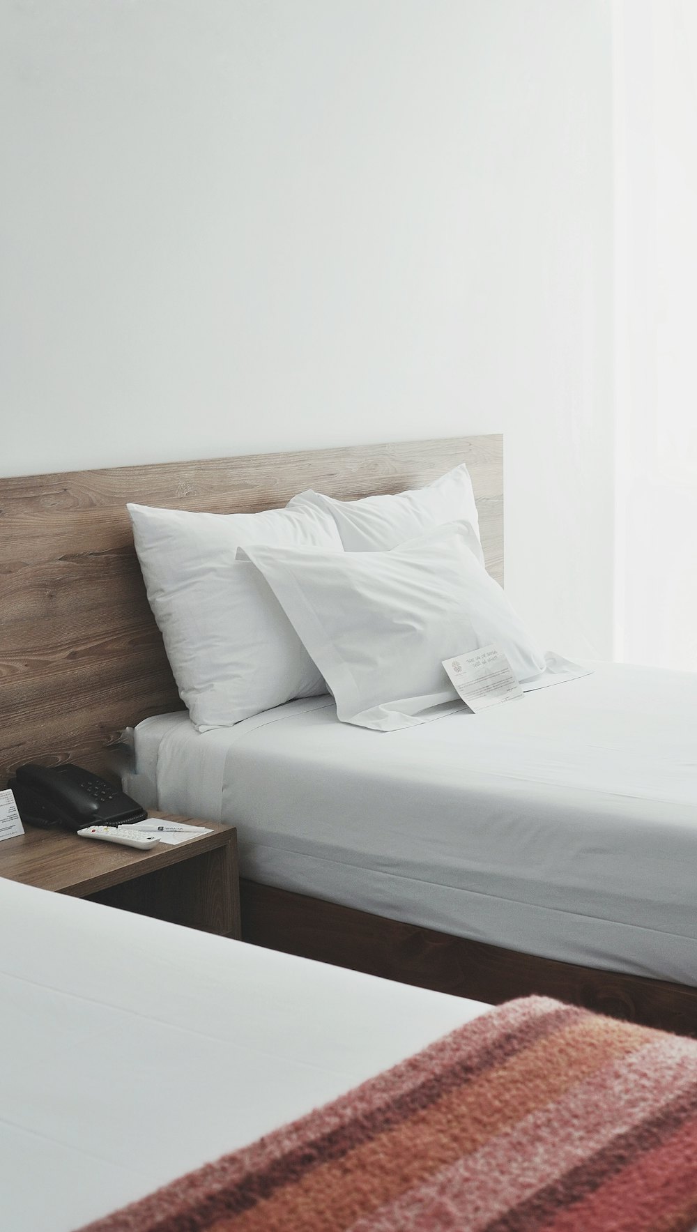 Pillows arranged on a hotel bed